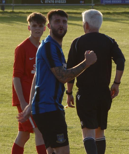 Shane Walsh celebrates scoring for Hakin against the Bridge